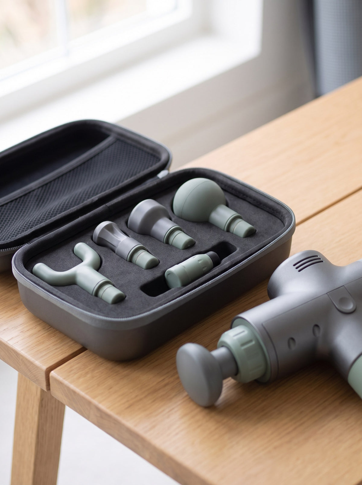 Pulse Pro Massage Gun hard case with six interchangeable heads